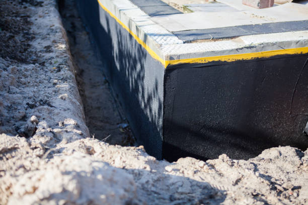 Professional Waterproofing technician working in Farmington, NY